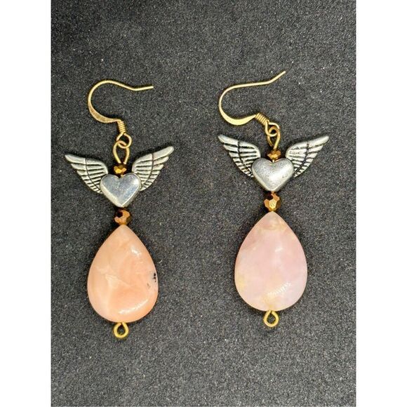 Nice pink stone and silver tone Angel wings earrings Good Condition minor black - Picture 1 of 5